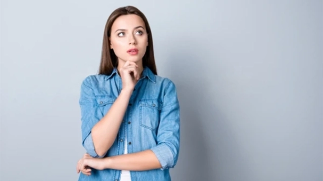 Woman thinking about where to buy health insurance in Mexico as an expat.
